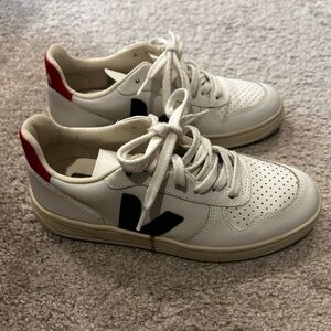 White Sneakers with Red and Black Accents